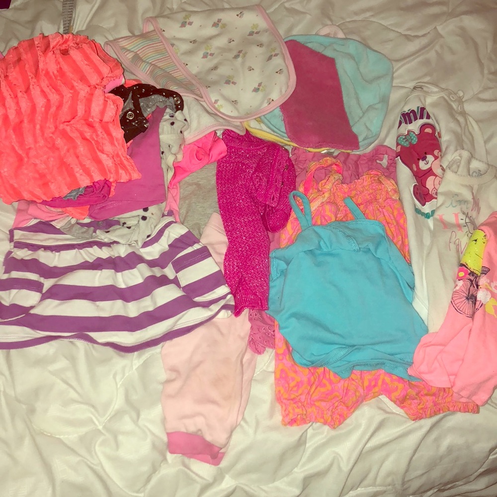 11 shirts, 3 shirts, 3 tanks, 3 wash cloths